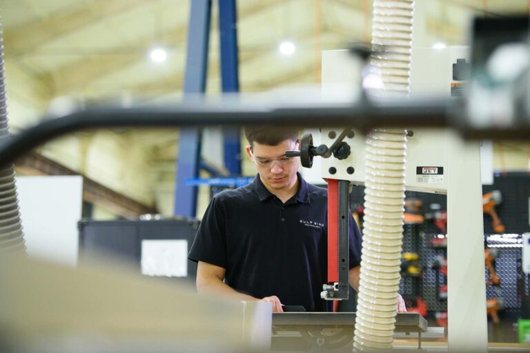 Engineer working on CNC machine