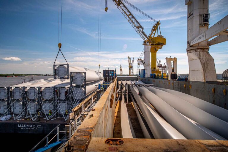 Wind Turbine blades being unloaded off a barge